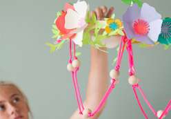 Annabel Wrigley teaches you with your child how to cut out flowers and vines using a Cricut Explore machine. Learn to make paper flowers in this children's crafting project.